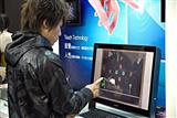A consumer using an all-in-one PC
