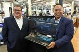 Kevin Jones, Micro Center vice president (left)