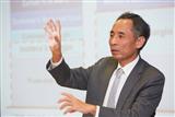 Charles Kau, executive VP of Tsinghua Unigroup and acting chairman of YMTC