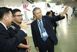 Yasuo Nishiguchi. right, chairman and CEO of Japan's IC designer Socionext