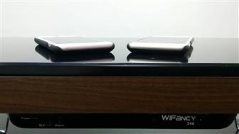 The under-table wireless charger supports table tops up to 5 cm thick and charging two phones at the same time.