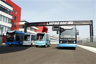 A 6m long autonomous shuttle bus (second right) and a 4m long one (second left)