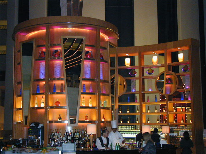 Atrium Bar at the Marriott Marquis in New York City. The shelving is lit by Color Kinetics.