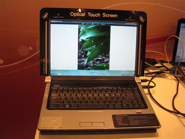 A Dell notebook that features Quanta's Optical Touch Screen